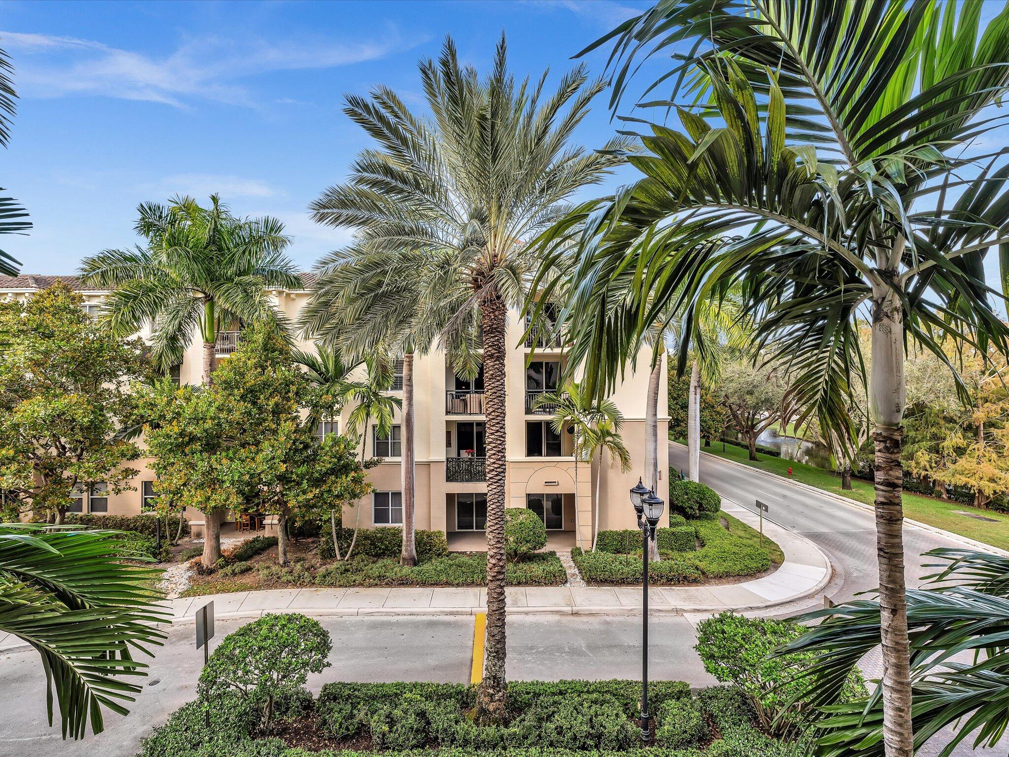 4303 Renaissance Way, Unit 303 Boynton Beach, FL 33426 - Photo 7 of 74 a view of a palm trees front of house