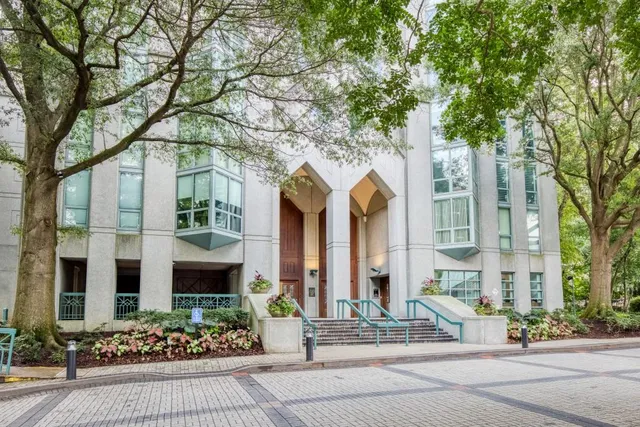 a front view of a building with street view