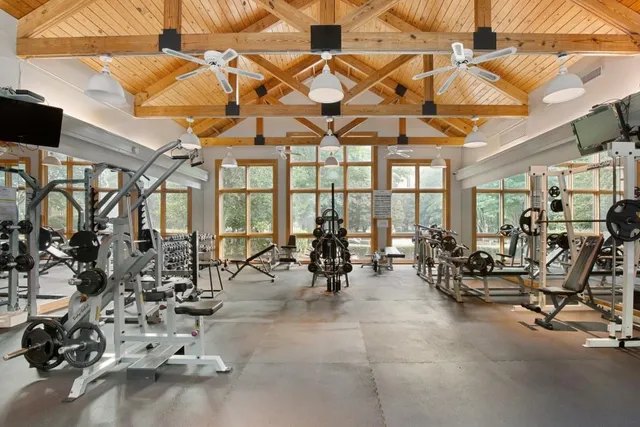 a view of swimming pool with a patio