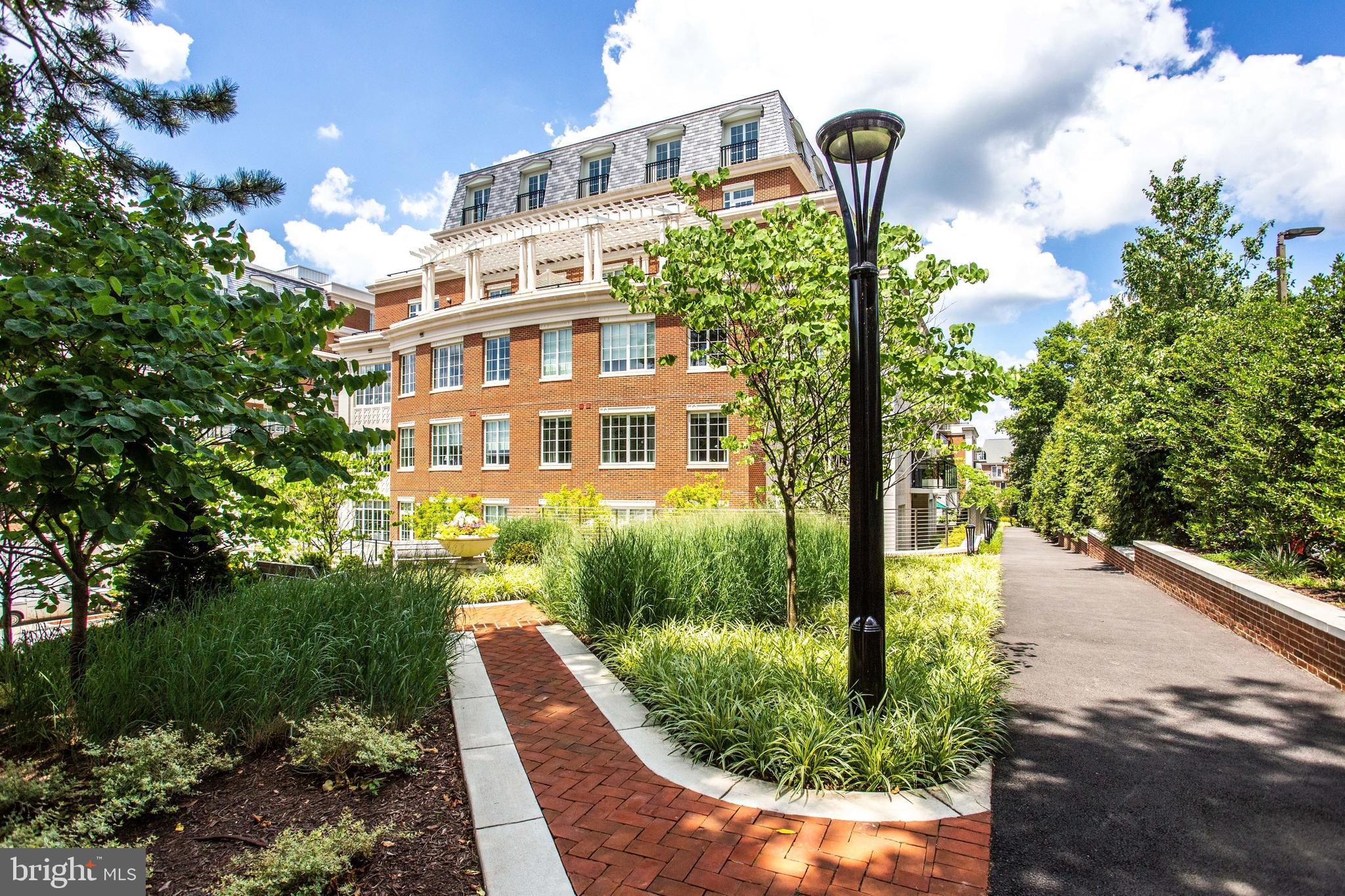 6900 Fleetwood Road, Unit 317 McLean, VA 22101 - Photo 36 of 56 a front view of a building with garden