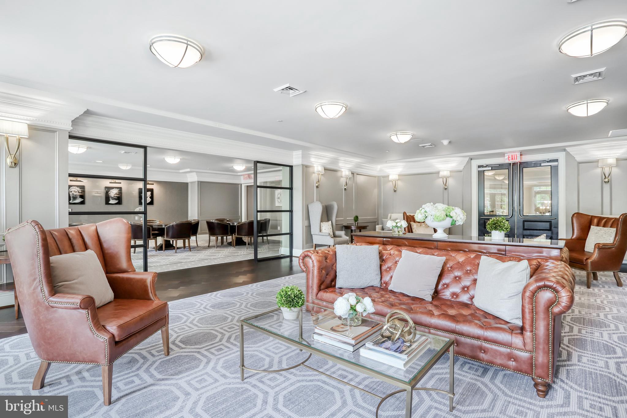 6900 Fleetwood Road, Unit 317 McLean, VA 22101 - Photo 53 of 56 a living room with furniture and a wooden floor