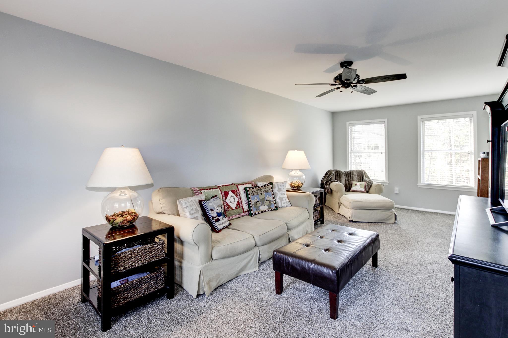 9414 All Saints Road Laurel, MD 20723 - Photo 10 of 35 Comfortable Family room with over-size windows