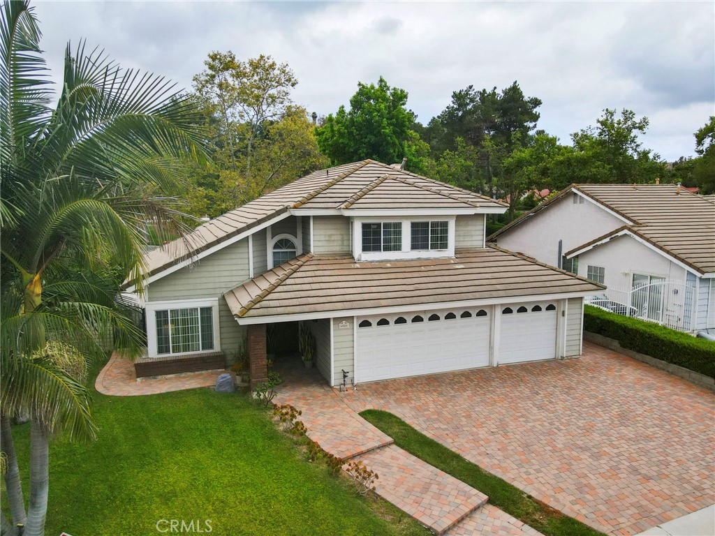 605 Bronco Way Walnut, CA 91789 - Photo 59 of 69 a front view of a house with a garden
