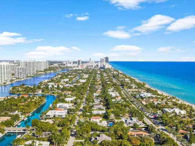 a view of backyard with swimming pool