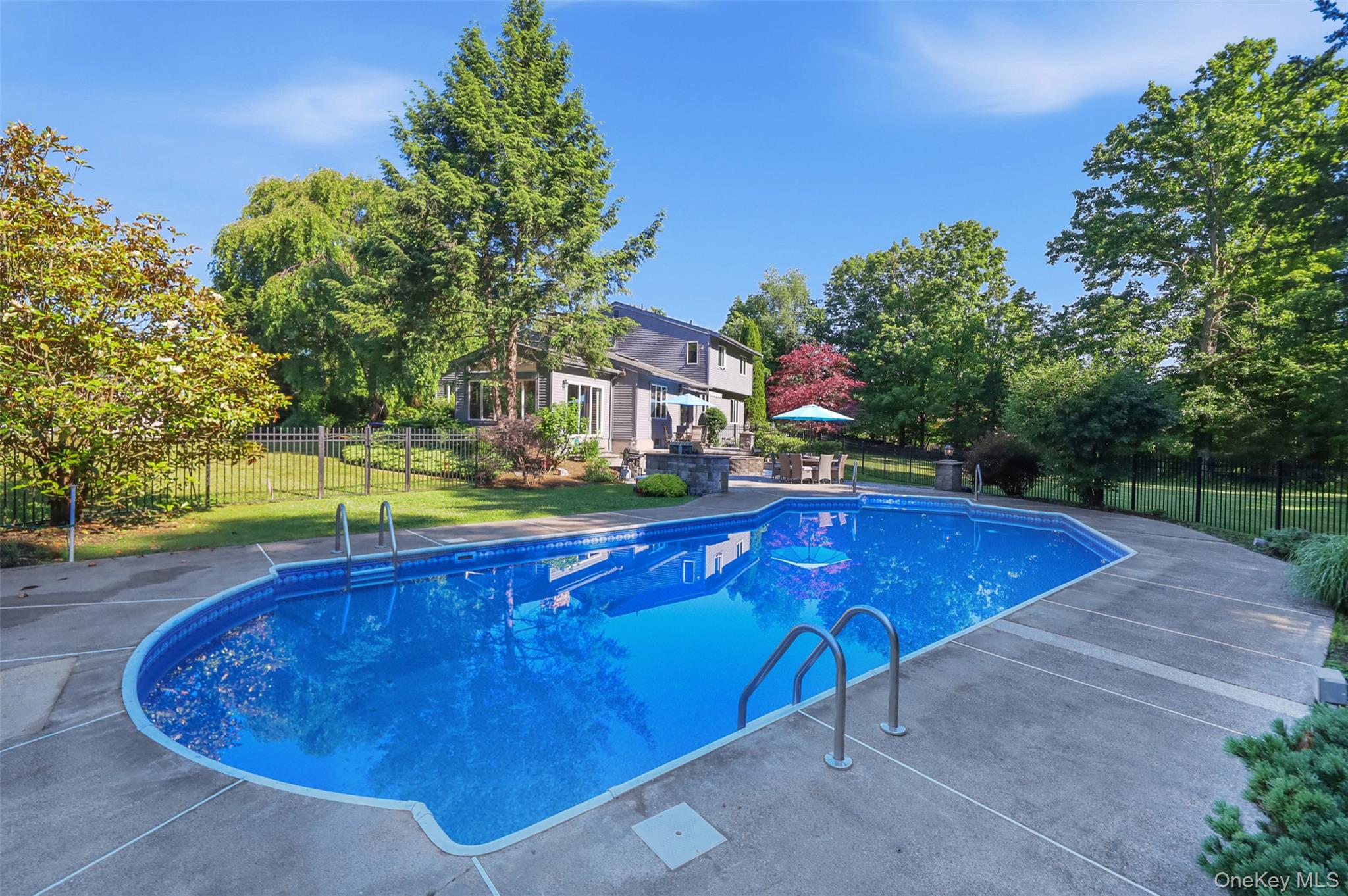 985 Craigville Road Chester, NY 10918 - Photo 16 of 36 In-ground swimming pool with concrete surround