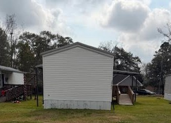 24455 Needham Road Porter, TX 77365 - Photo 2 of 8 a view of a house with a yard