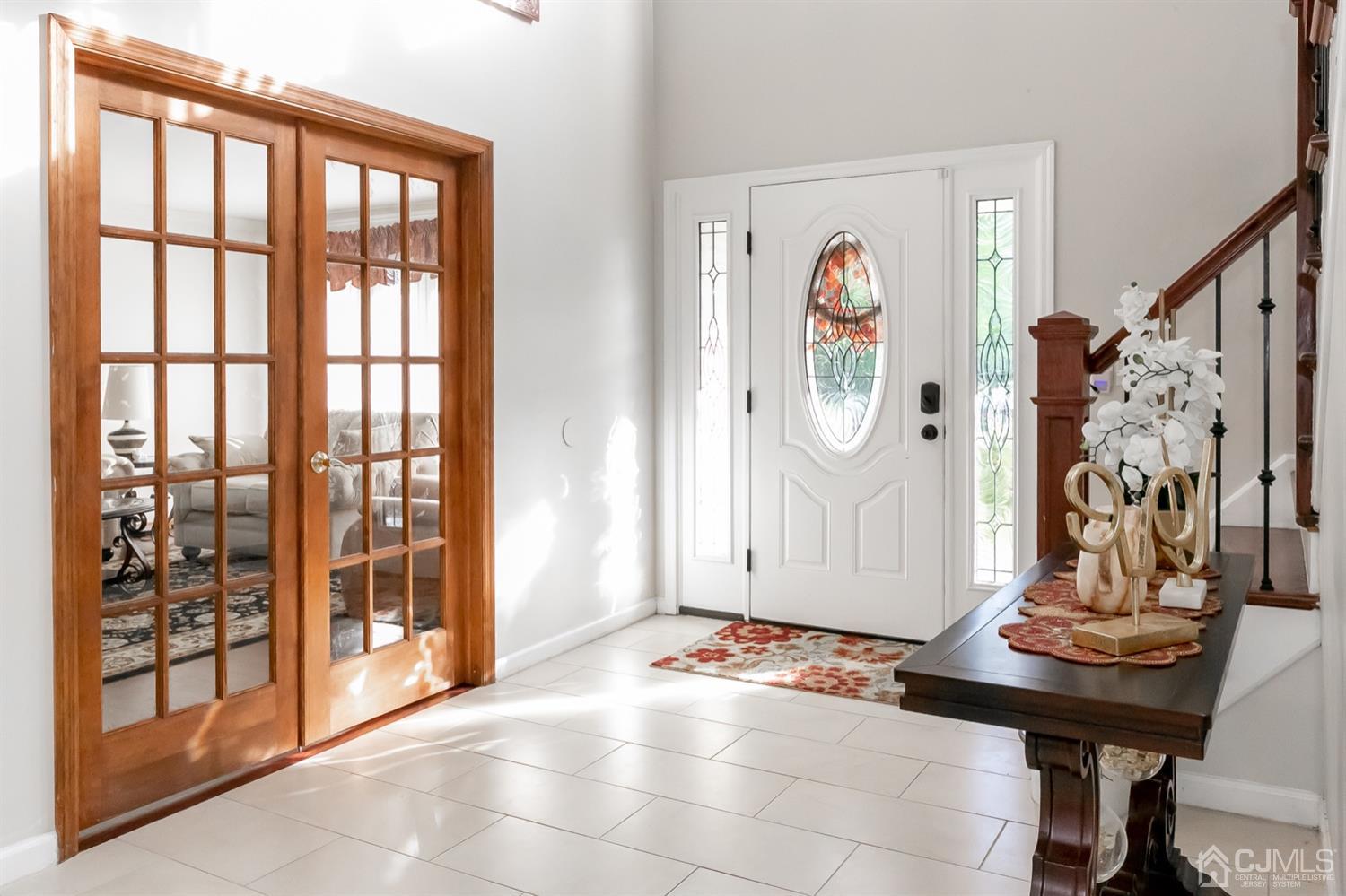 8 Peppermint Hill Road North Brunswick, NJ 08902 - Photo 12 of 32 a view of an entryway with wooden floor