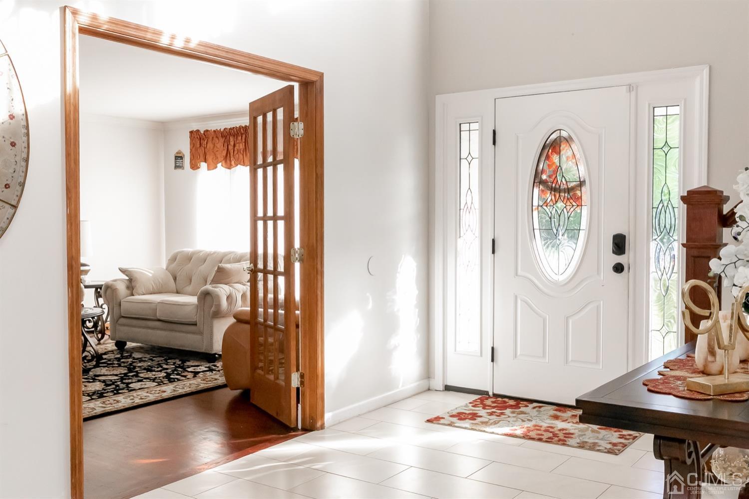 8 Peppermint Hill Road North Brunswick, NJ 08902 - Photo 13 of 32 a living room with furniture and a window
