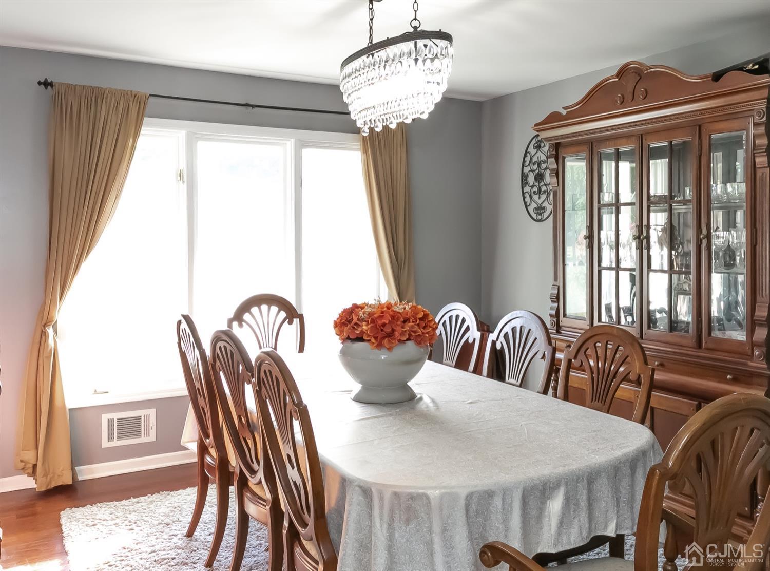 8 Peppermint Hill Road North Brunswick, NJ 08902 - Photo 20 of 32 a view of a dining room with furniture window and outside view