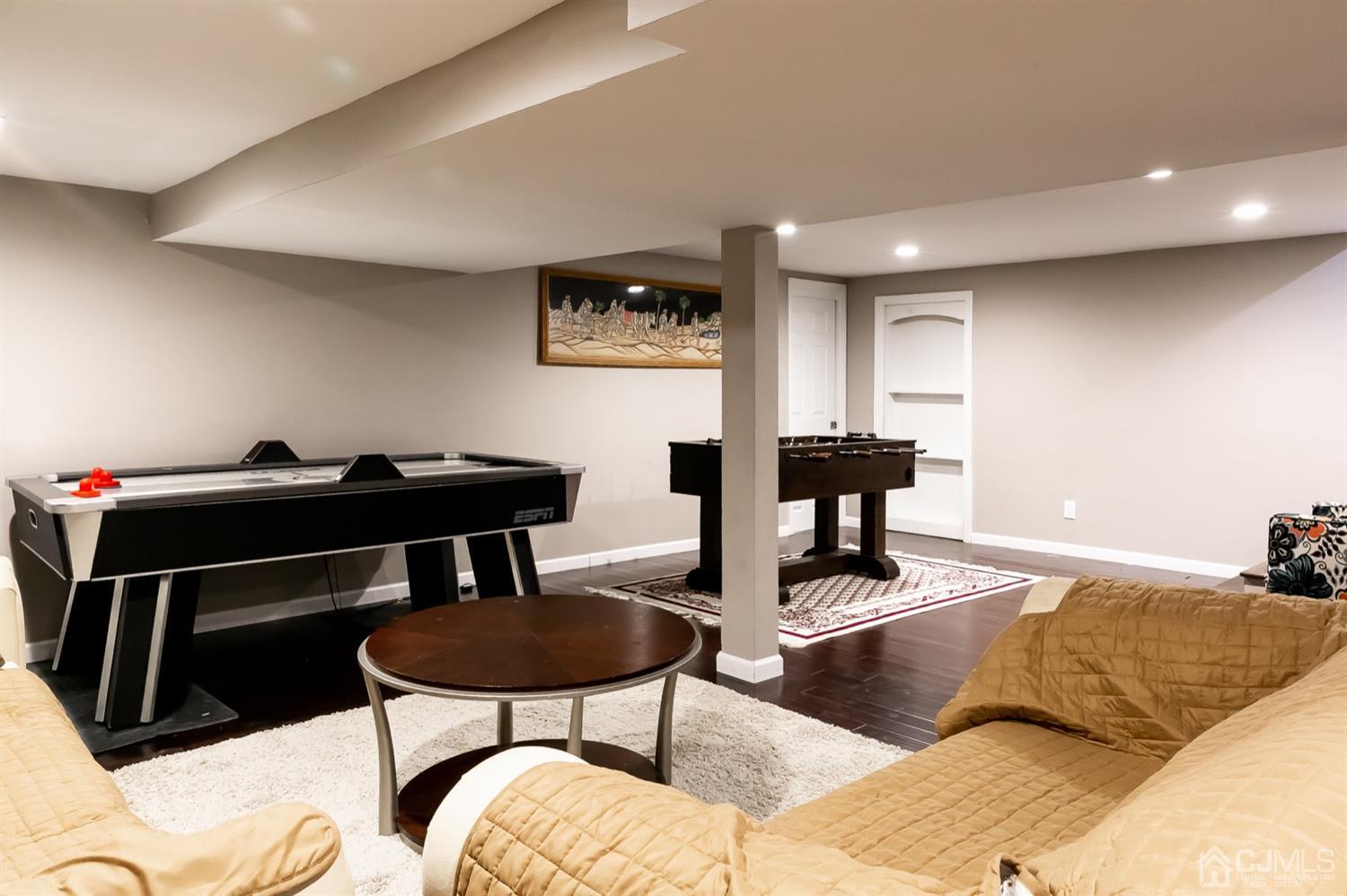 8 Peppermint Hill Road North Brunswick, NJ 08902 - Photo 29 of 32 a living room with furniture and a table