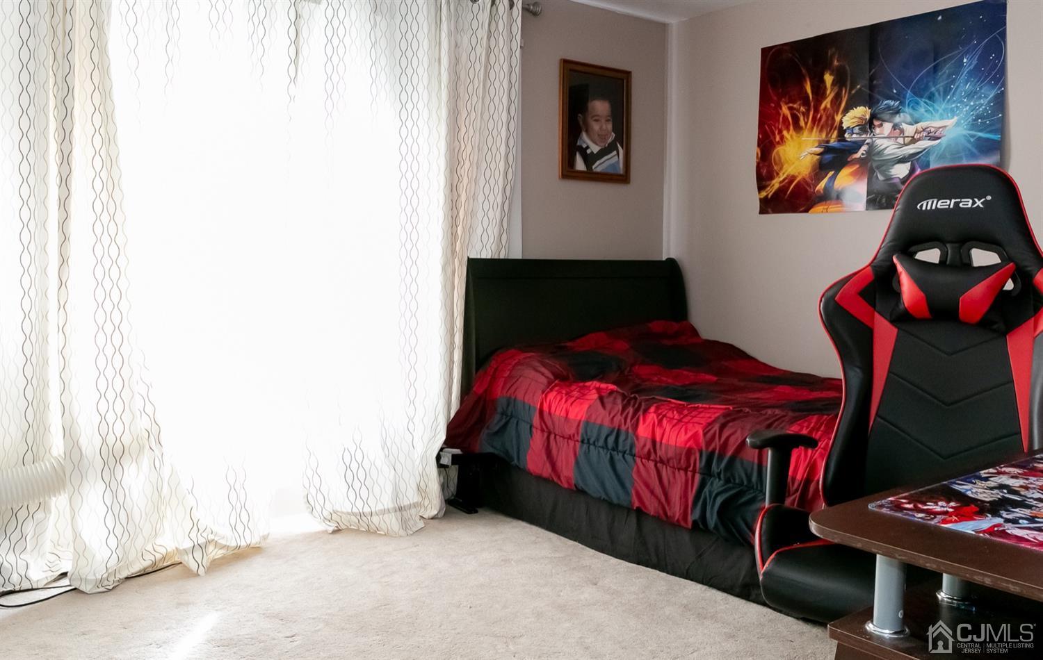 8 Peppermint Hill Road North Brunswick, NJ 08902 - Photo 6 of 32 a bedroom with a bed and a painting on the wall