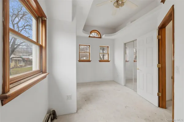 an empty room with windows