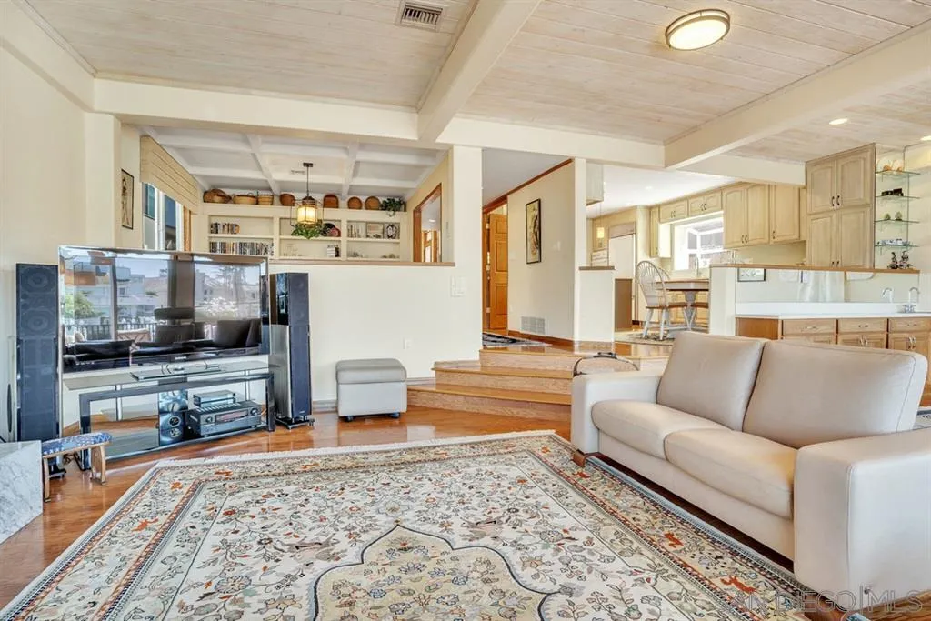 26 The Point Coronado, CA 92118 - Photo 11 of 23 a living room with furniture and a rug