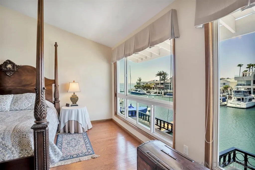 26 The Point Coronado, CA 92118 - Photo 13 of 23 a living room with furniture and a wooden floor