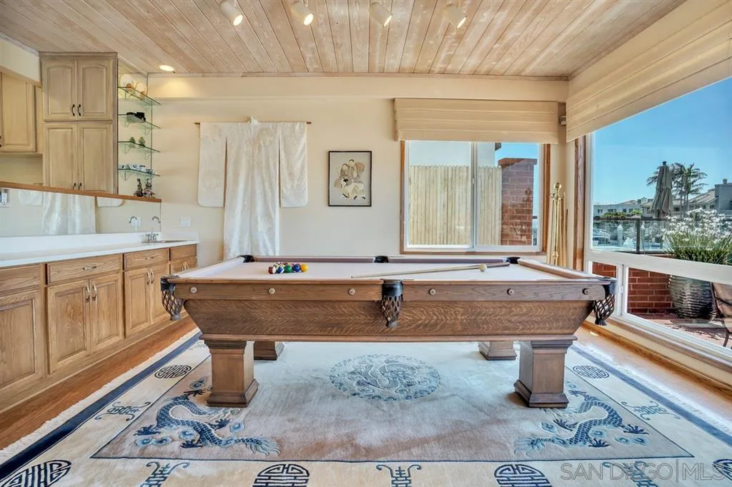 26 The Point Coronado, CA 92118 - Photo 4 of 23 a room with pool table and windows