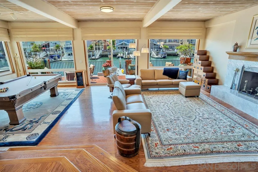 26 The Point Coronado, CA 92118 - Photo 9 of 23 a living room with furniture and a fireplace