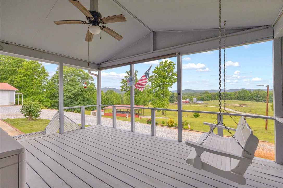 721 Cedar Crest Trail Walhalla, SC 29691 - Photo 5 of 47 Relax on this inviting screened porch with panoramic pastoral views.