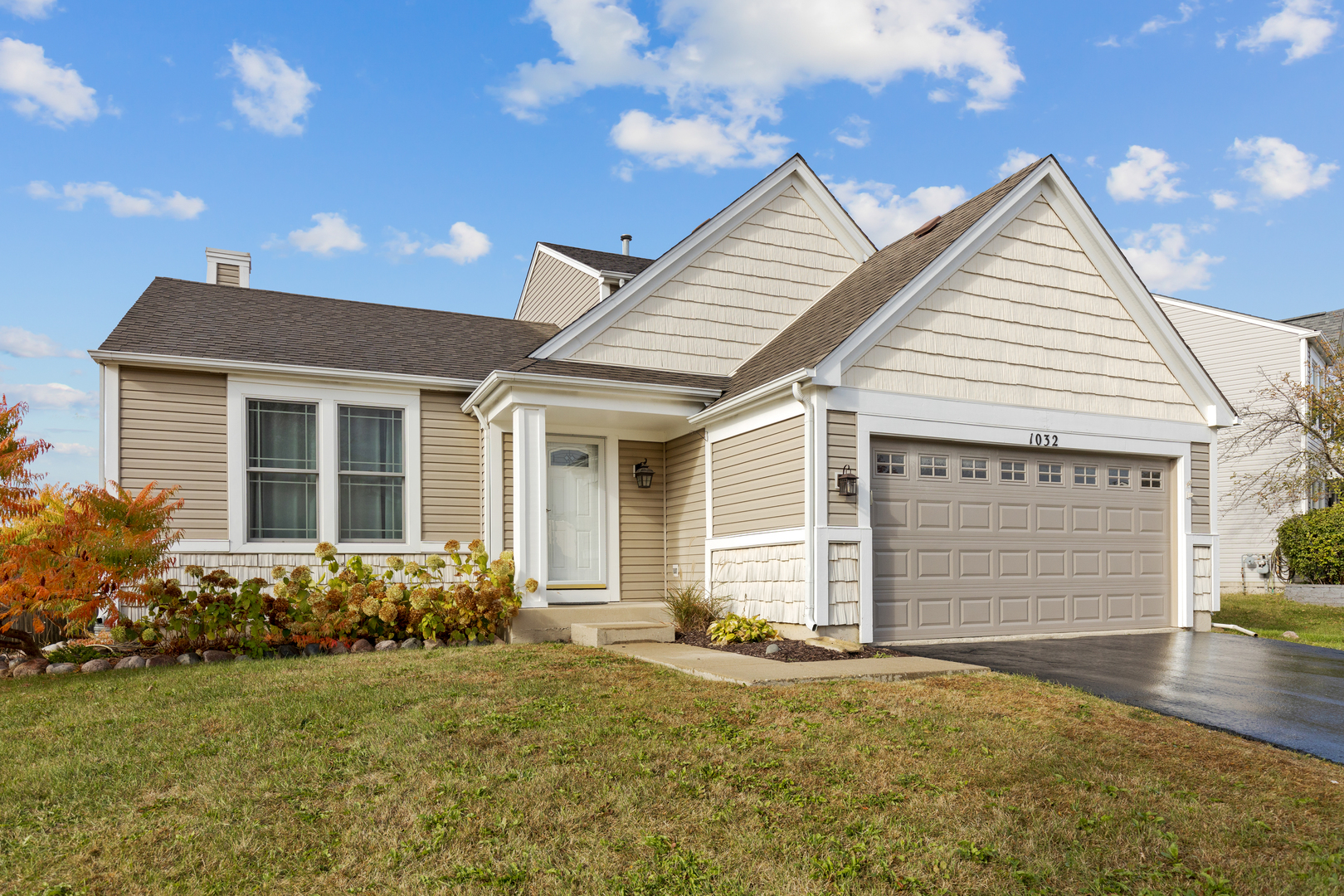 1032 Willow Bay Elgin, IL 60123 - Photo 1 of 27 front view of a house with a yard