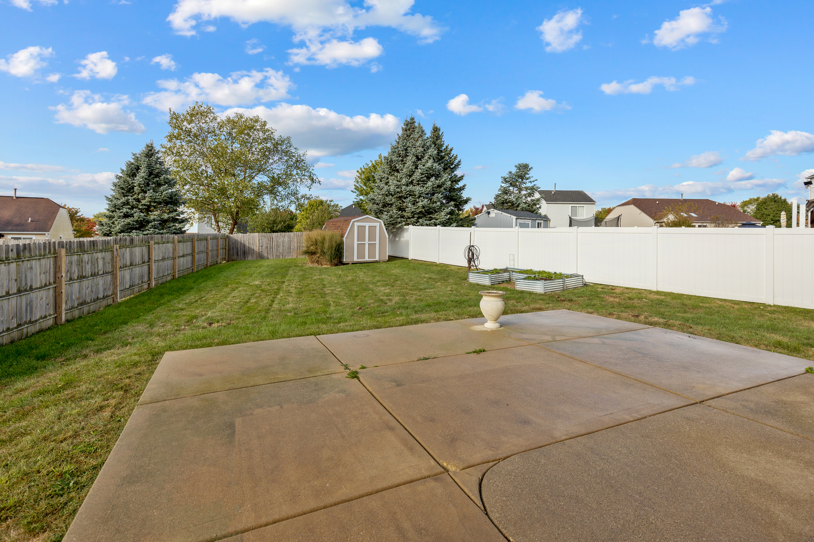 1032 Willow Bay Elgin, IL 60123 - Photo 20 of 27 a view of a backyard