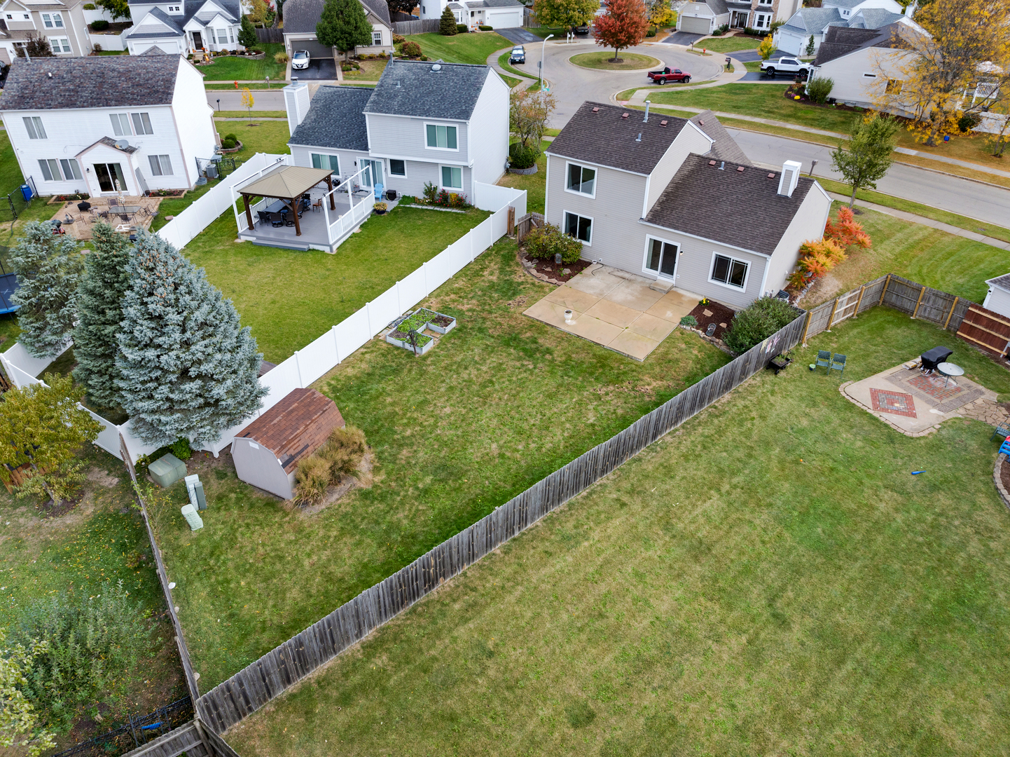 1032 Willow Bay Elgin, IL 60123 - Photo 24 of 27 a aerial view of a house with a garden and houses