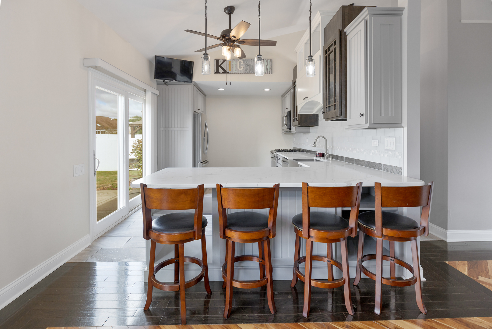 1032 Willow Bay Elgin, IL 60123 - Photo 7 of 27 a view of a dining room with furniture and wooden floor