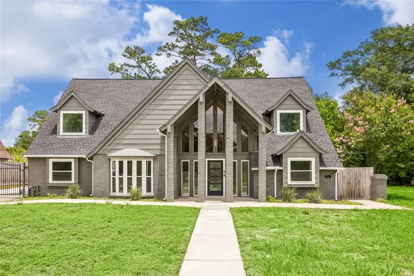 a house view with a garden space