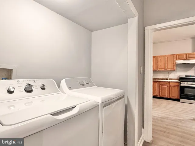 a utility room with dryer and washer