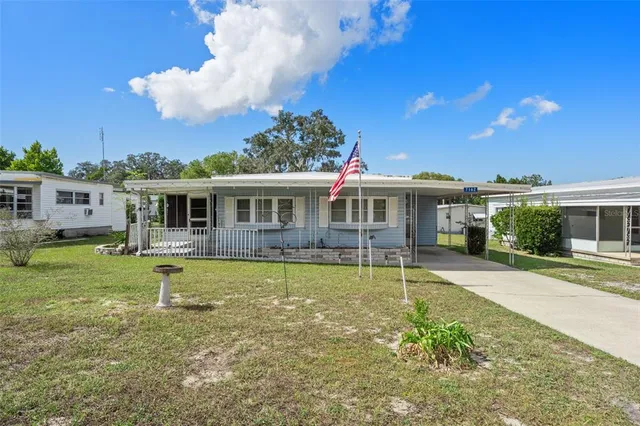 a view of a house with a swimming pool