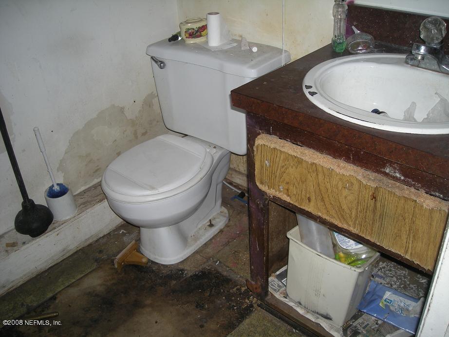 3335 Hunt Street Jacksonville, FL 32254 - Photo 9 of 10 a bathroom with a toilet and a sink