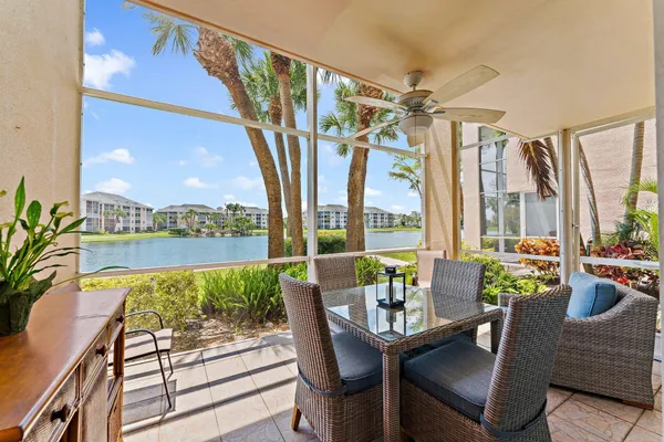 a view of a city from a dining room with furniture window and outside view