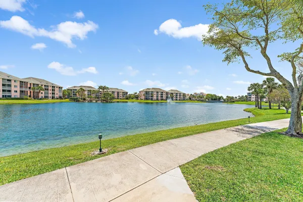 a view of a lake with a building in the background