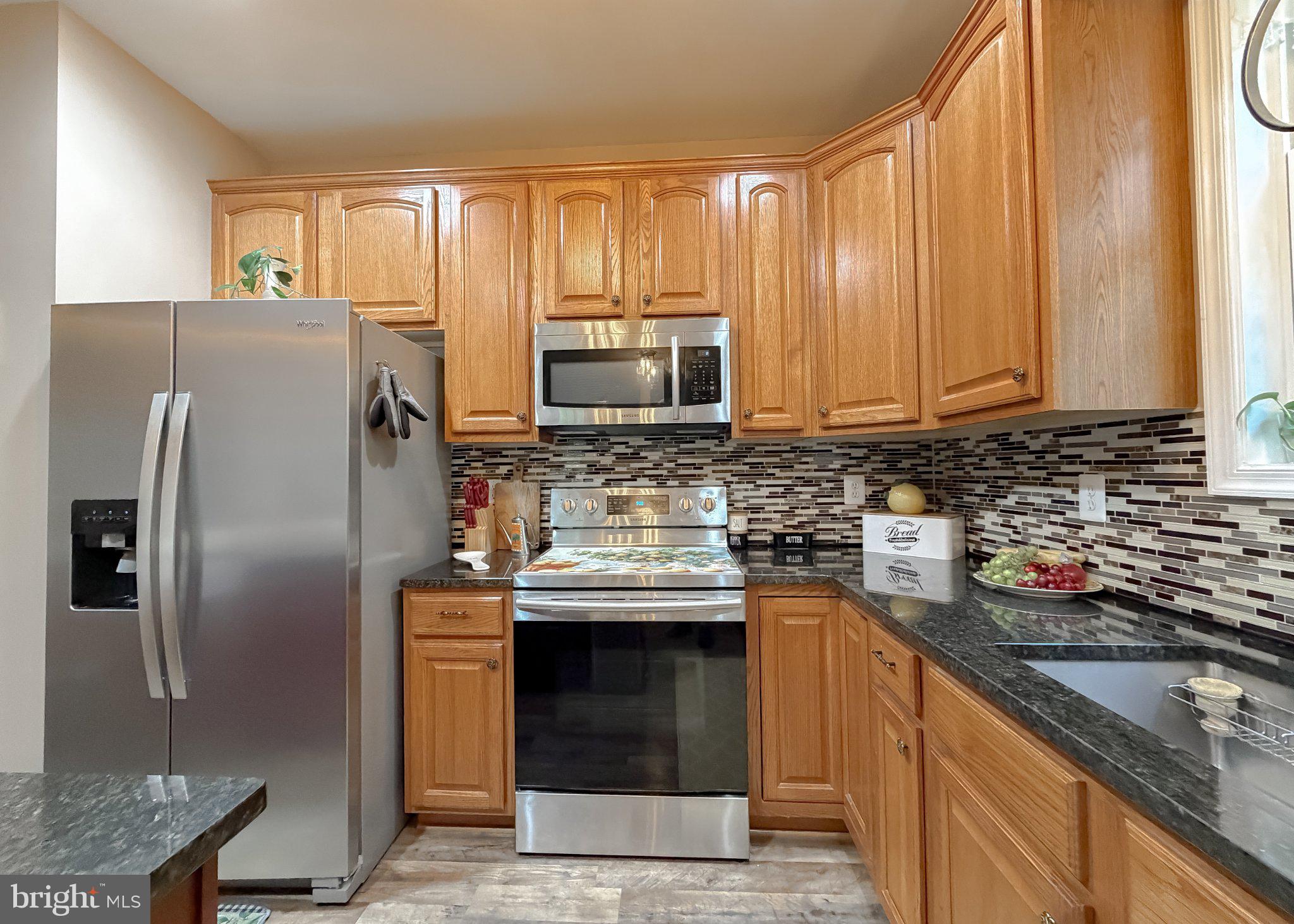6020 Port Tobacco Road Indian Head, MD 20640 - Photo 46 of 59 Modern kitchen with warm wood tones.