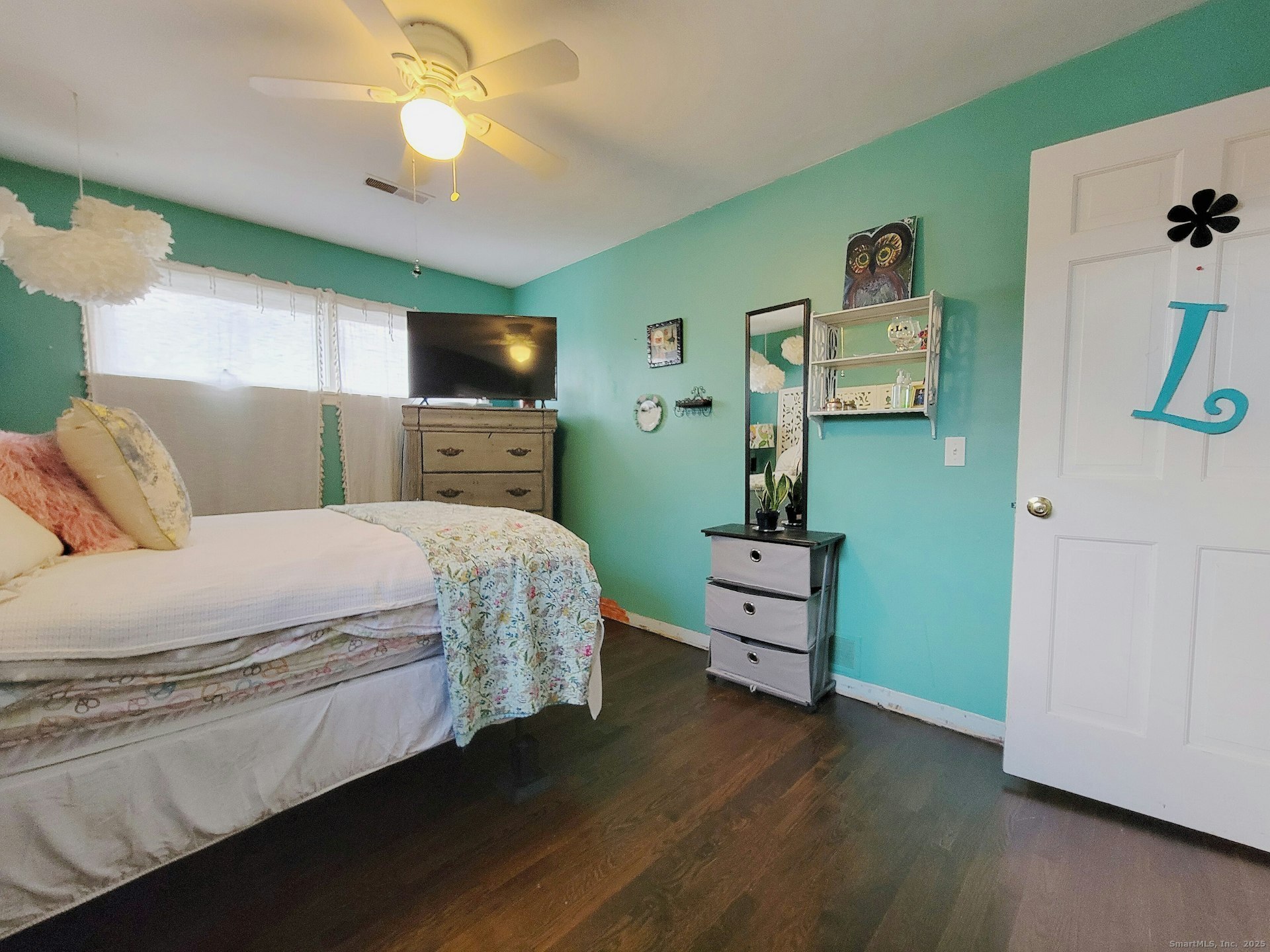4 Candlewood Knolls Road New Fairfield, CT 06812 - Photo 13 of 21 a bedroom with a bed and a flat screen tv