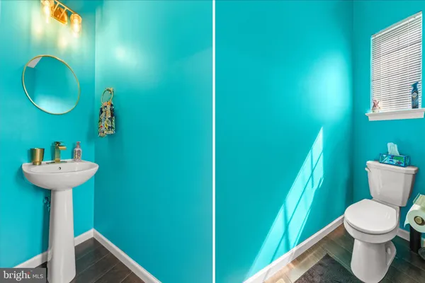 a bathroom with a toilet and a sink