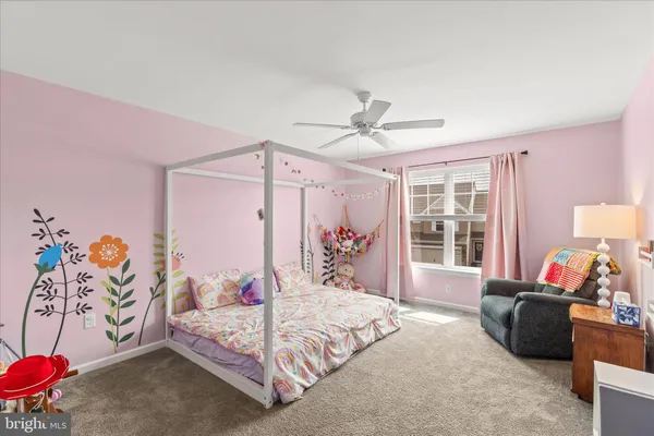 a bed room with a bed and a couch
