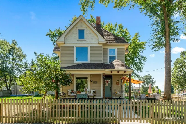 a front view of house with a yard