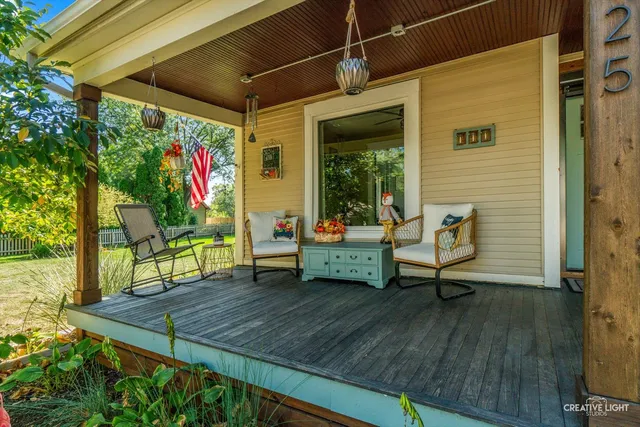 a view of a chairs and table in a patio