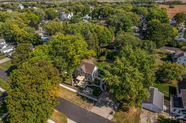 an aerial view of a house with swimming pool