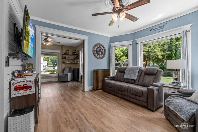 a living room with furniture and a window