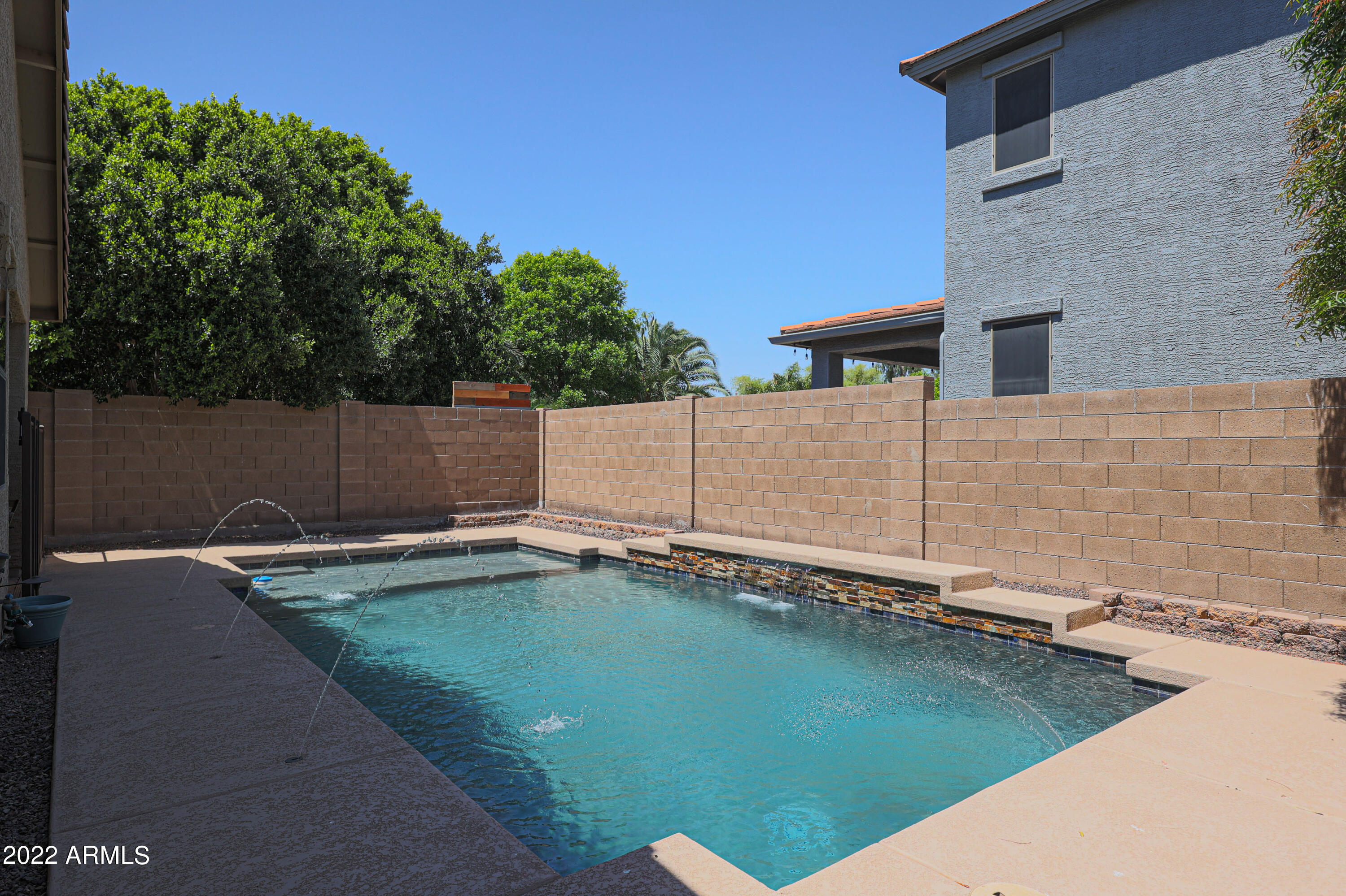 17930 West Hatcher Road Waddell, AZ 85355 - Photo 4 of 44 Sparkling play pool