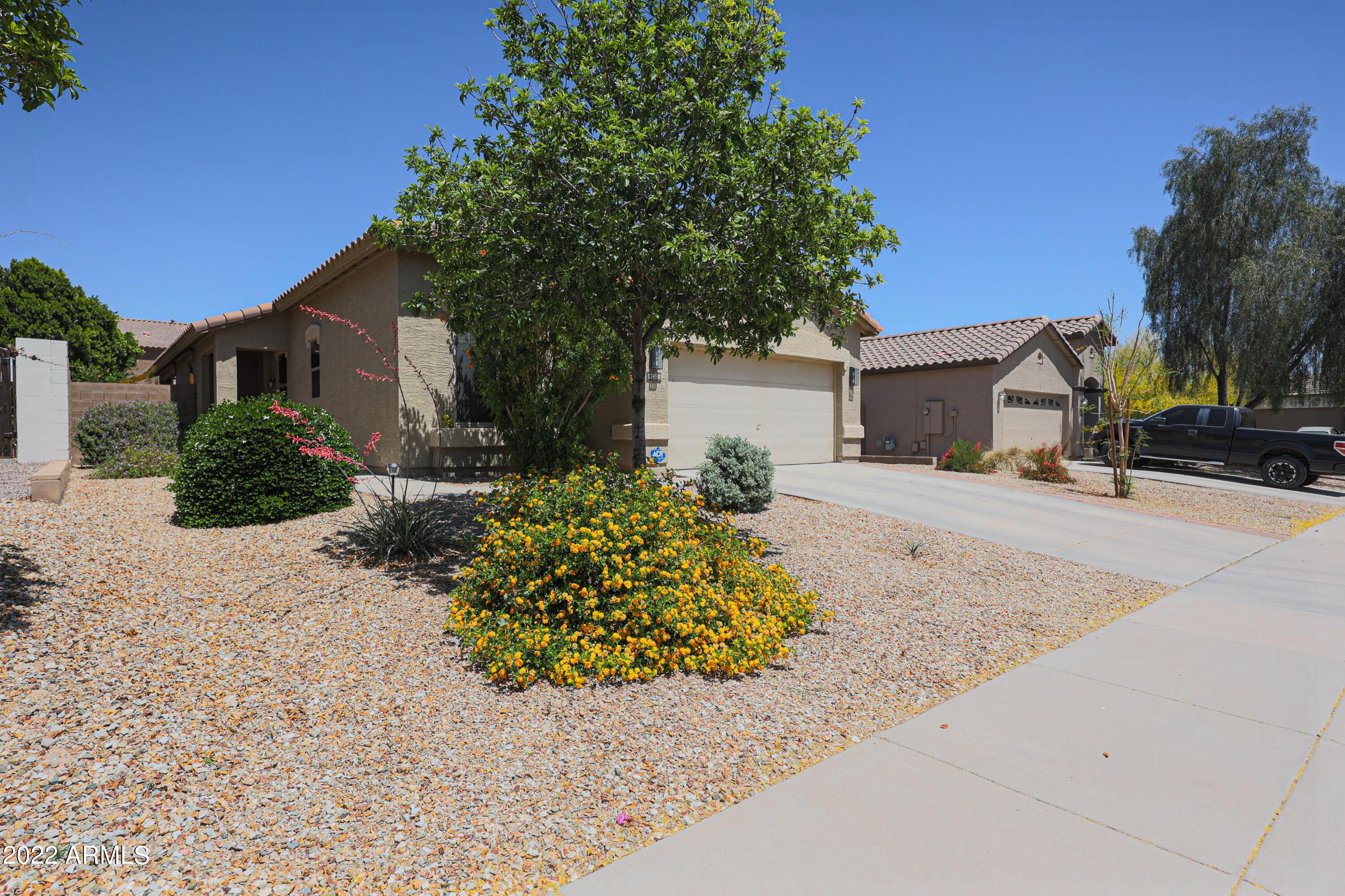 17930 West Hatcher Road Waddell, AZ 85355 - Photo 7 of 44 Low maint. landscape