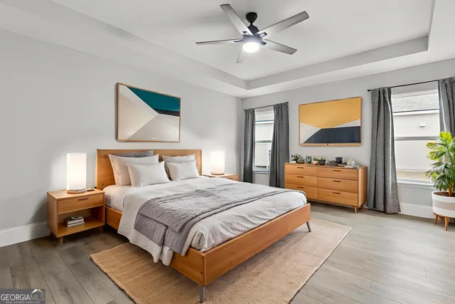 a bathroom with a bathtub a shower and a sink