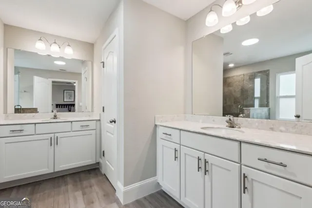 a view of a workspace with furniture and gym equipment