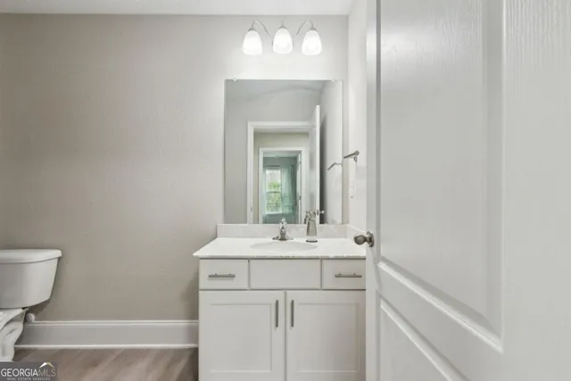 a house that has a big yard in front of it