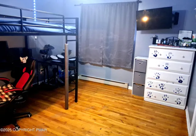 a living room with furniture with gym equipment