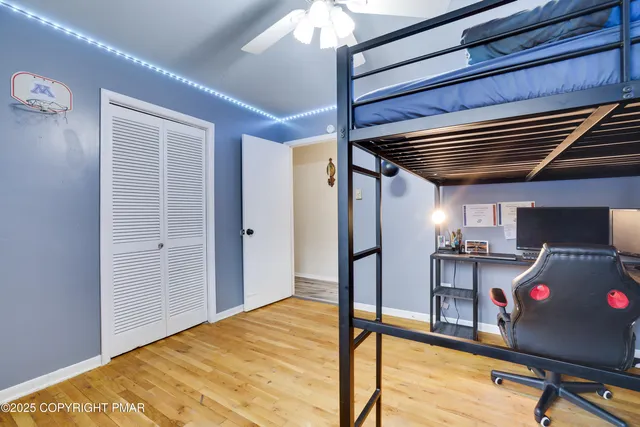 a view of a backyard with swimming pool