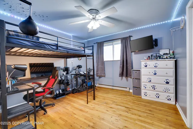 a wooden bench sitting in the middle of a yard