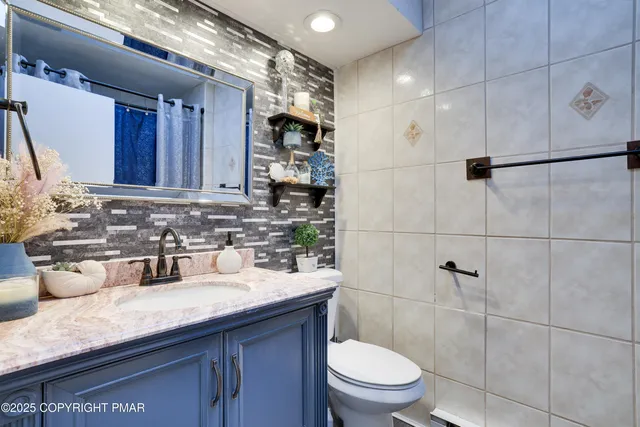 an aerial view of lake residential houses with outdoor space