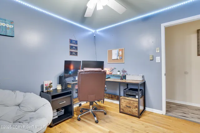an aerial view of a house with a ocean view