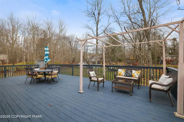 a room with furniture and flat screen tv